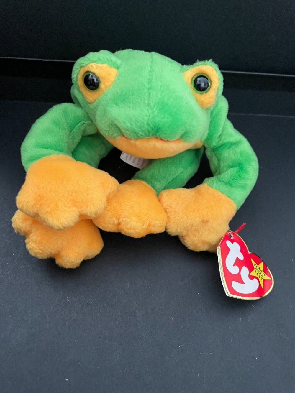 Smoochy the Frog, a retired plush toy from the Ty Beanie Babies-NWT